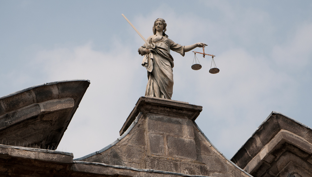 Why is Lady Justice blindfolded? - Quora