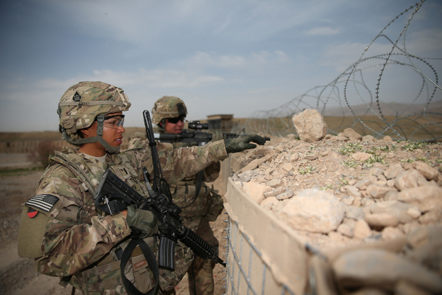 Woman in US Military working on force protection drill