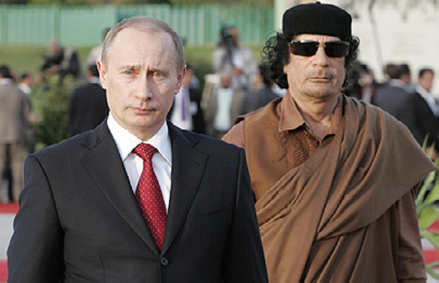 Vladimir Putin and Muammar Gaddafi