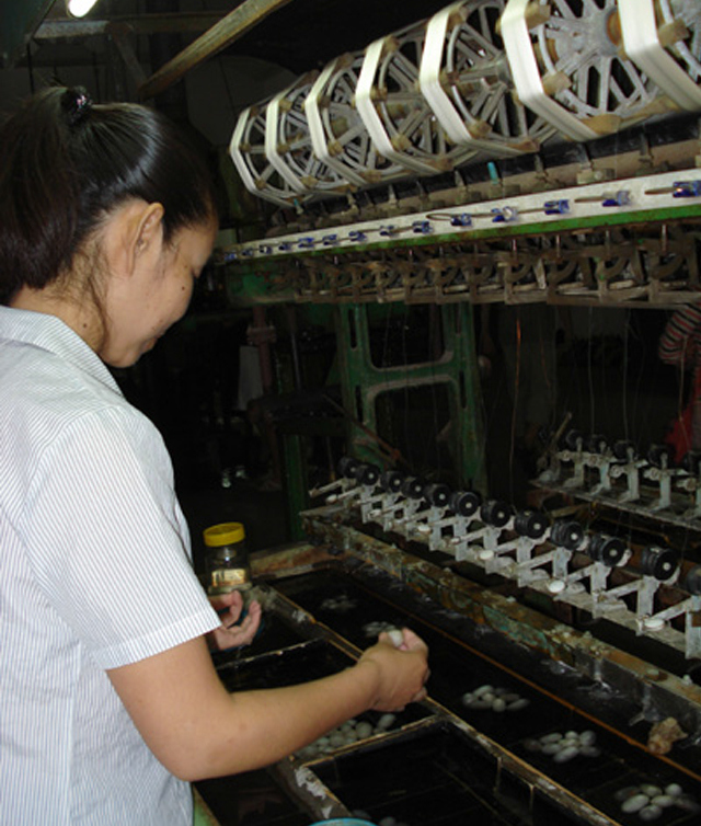 A Chinese woman workign in a factory in Suzhou.