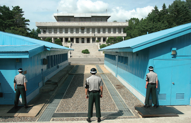 ROK soldiers watch the Korean border at Panmumjeom