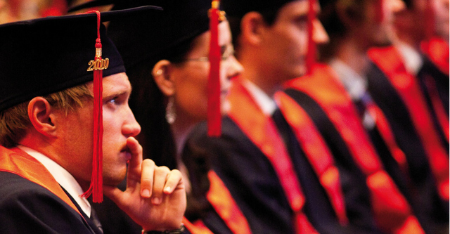 Graduates getting their degree