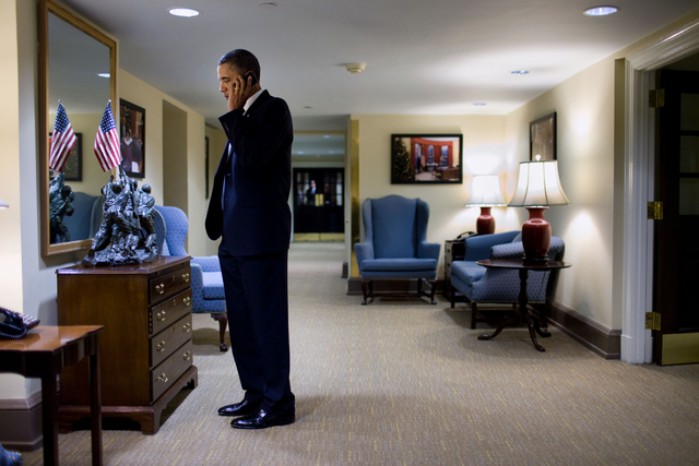 President Obama on the phone with Governor Jan Brewer in the wake of the Gabrielle Giffords shooting incident