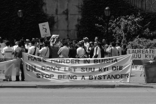 Activists gather to protest the detention of Aung San Suu Kyi.