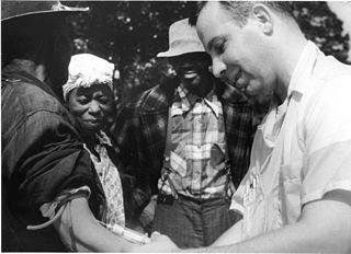 Doctor injecting a patient with placebo as part of the Tuskegee Syphilis Study