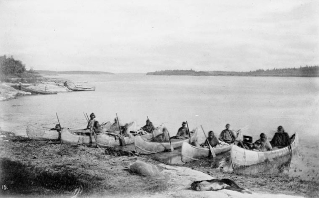 1878 photo depicting First Nations people of Manitoba, en route to hunting grounds, on the Nelson River.