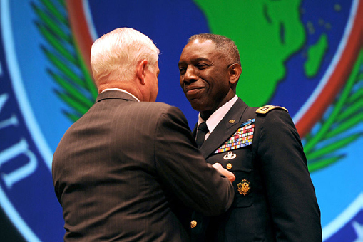 EX-SECRETARY OF DEFENSE, ROBERT M. GATES, PRESENTS THE DEFENSE DISTINGUISHED SERVICE MEDAL TO OUTGOING COMMANDER OF AFRICOM, GENERAL WILLIAM WARD, DURING THE AFRICOM CHANGE OF COMMAND CEREMONY